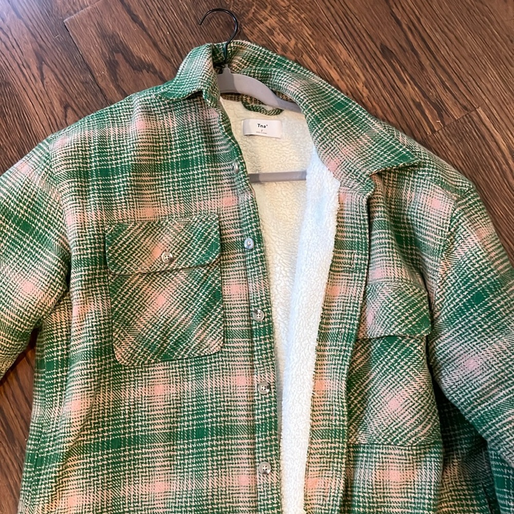 Aritzia TNA Shackey size 2.  Green and tan with Sherpa like interior.